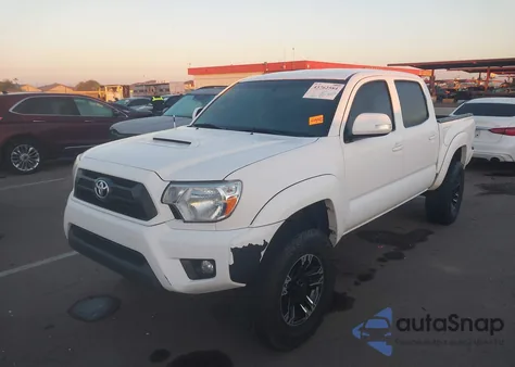 2015 Toyota Tacoma Base V6 z USA, uszkodzony, nr VIN 3TMLU4EN0FM188246